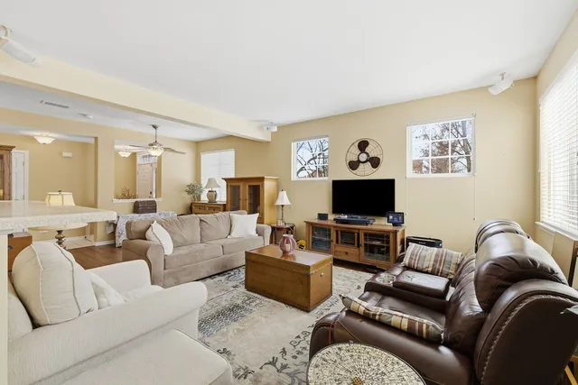 a living room with furniture or couch and a flat screen tv