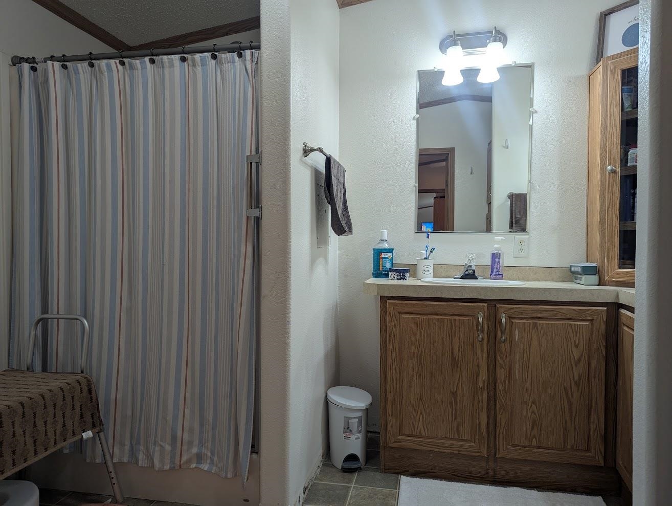 435 32 Road, Unit 628 Clifton, CO 81520 - Photo 11 of 31 a bathroom with a double vanity sink and a mirror
