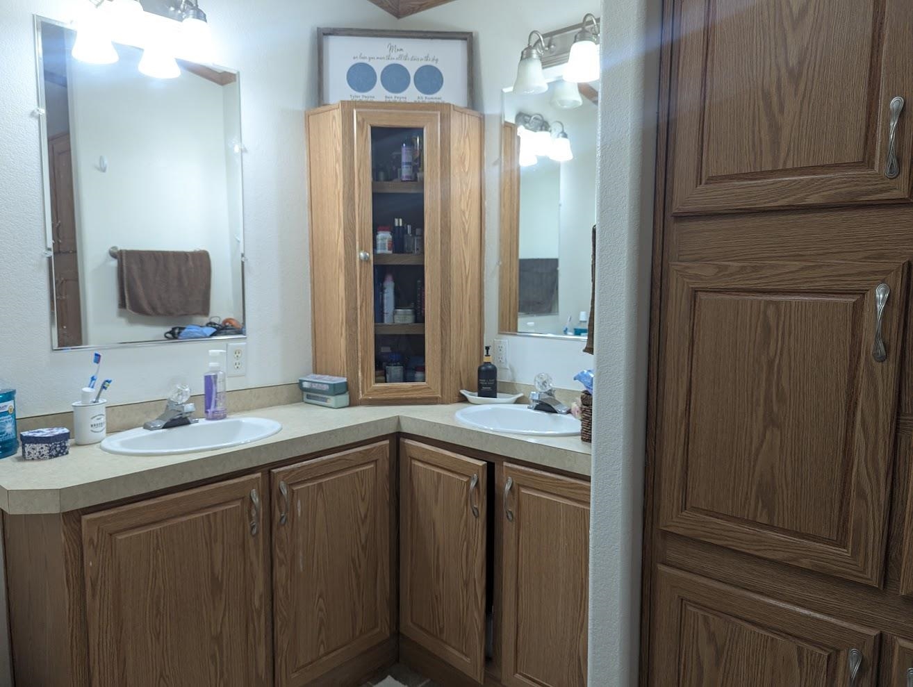 435 32 Road, Unit 628 Clifton, CO 81520 - Photo 12 of 31 a bathroom with double sink and a mirror