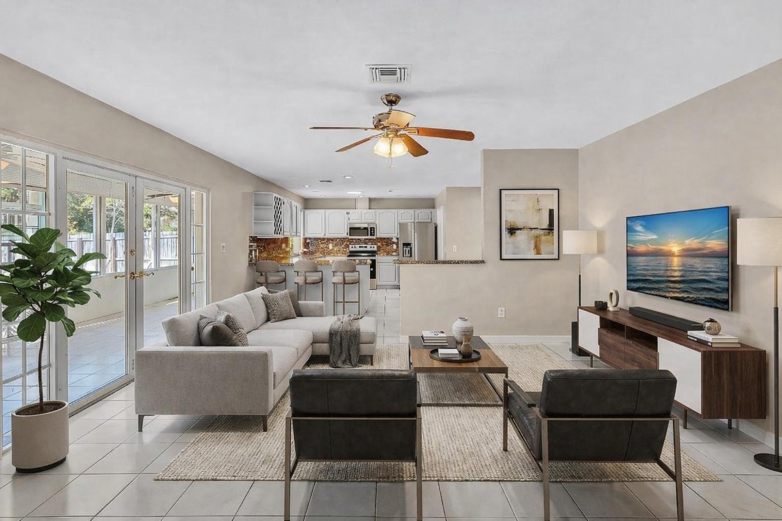 6144 Royal Lytham Drive Boca Raton, FL 33433 - Photo 11 of 70 a living room with furniture and a flat screen tv