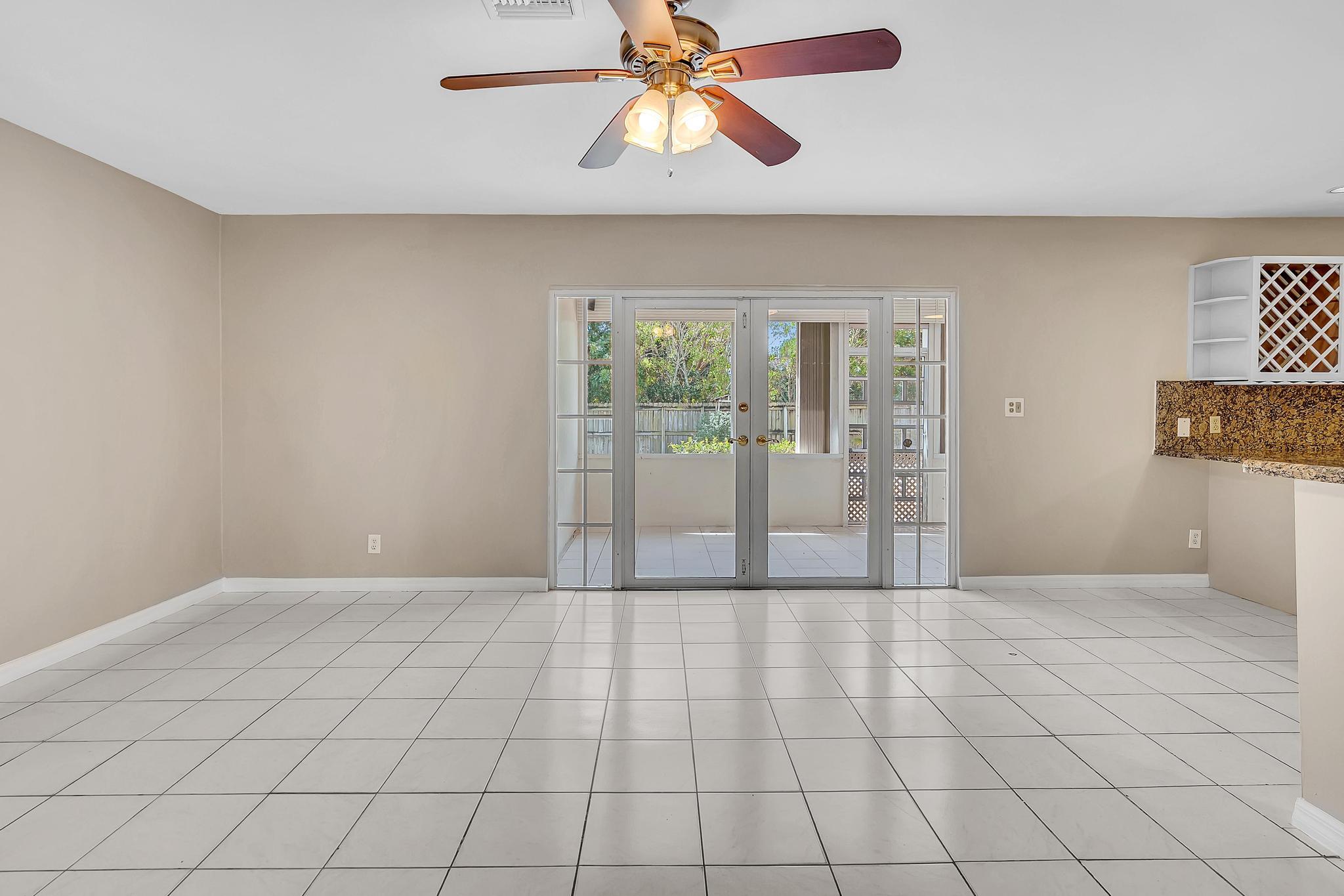 6144 Royal Lytham Drive Boca Raton, FL 33433 - Photo 14 of 70 a view of an empty room and window