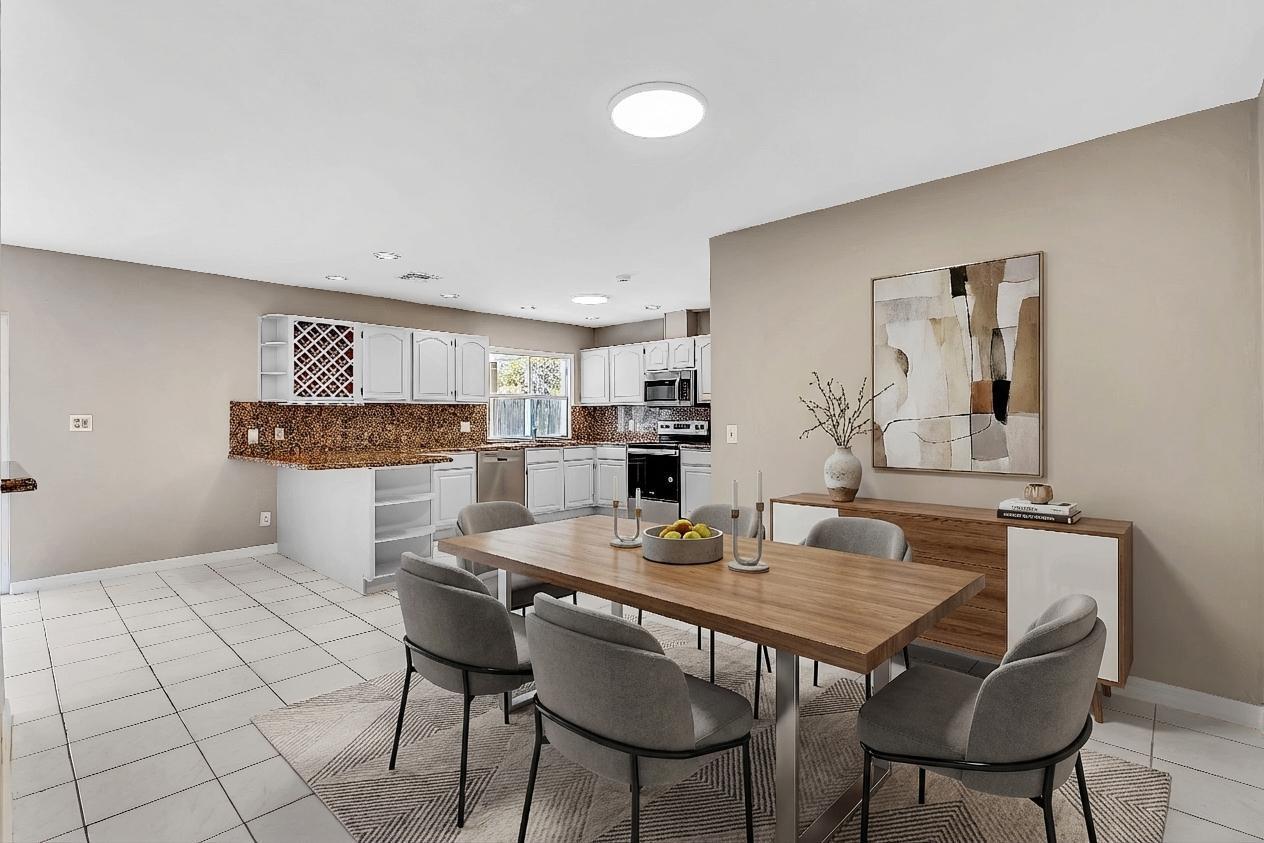 6144 Royal Lytham Drive Boca Raton, FL 33433 - Photo 19 of 70 a view of a dining room with furniture