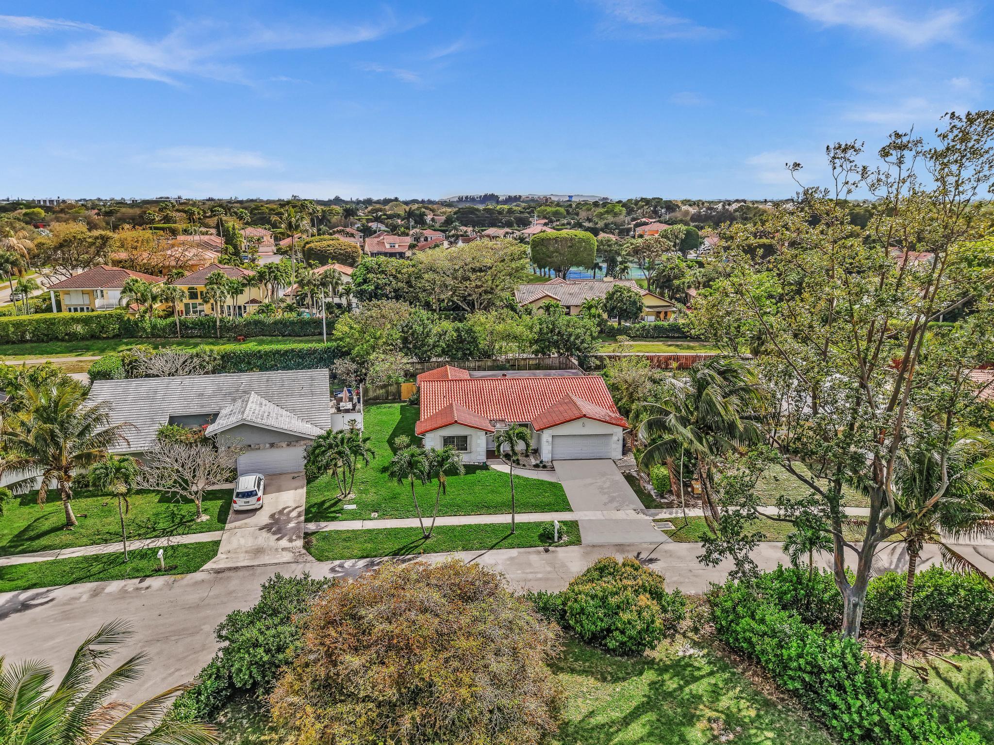 6144 Royal Lytham Drive Boca Raton, FL 33433 - Photo 3 of 70 an aerial view of a city