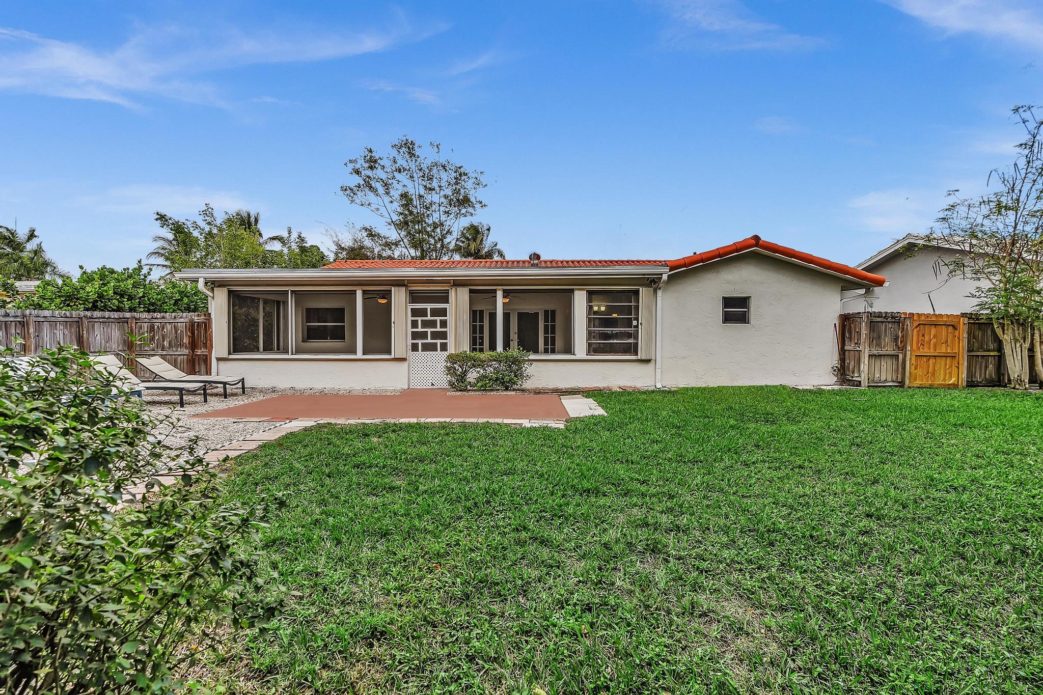 6144 Royal Lytham Drive Boca Raton, FL 33433 - Photo 40 of 70 a house view with a garden space