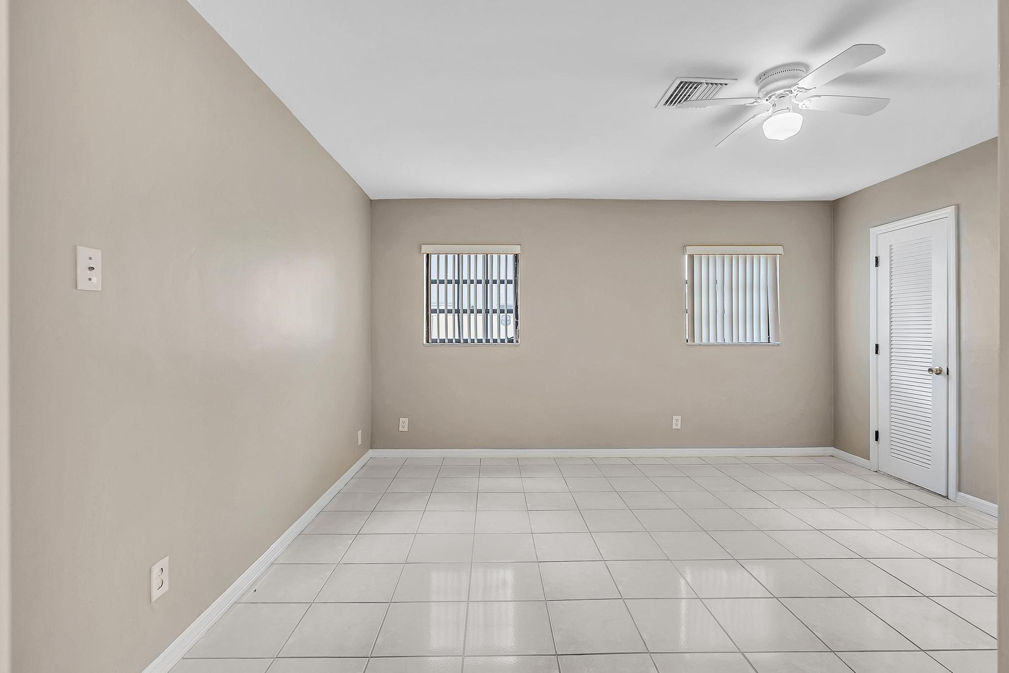 6144 Royal Lytham Drive Boca Raton, FL 33433 - Photo 43 of 70 a view of an empty room with a window