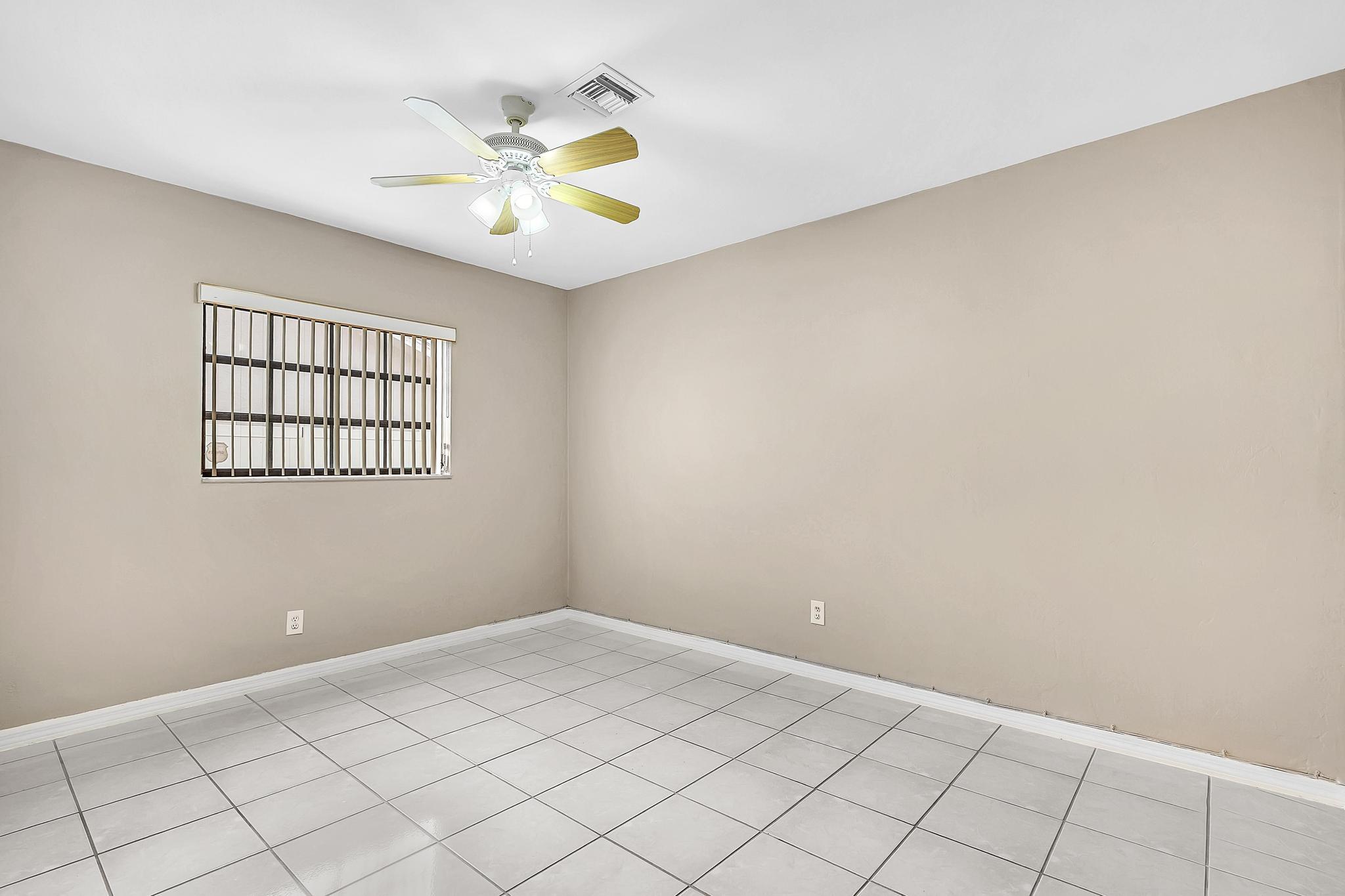 6144 Royal Lytham Drive Boca Raton, FL 33433 - Photo 54 of 70 a view of an empty room