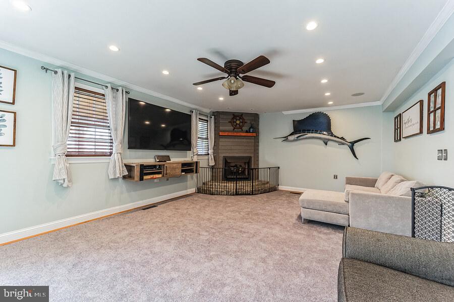 8110 Highpoint Road Clearwater Beach, MD 21226 - Photo 11 of 57 LR with New Carpet, Ceiling Fan & Crown Molding