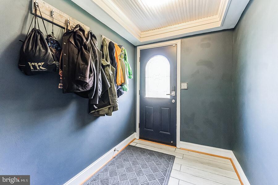 8110 Highpoint Road Clearwater Beach, MD 21226 - Photo 2 of 57 Foyer w/Crown Molding & Shiplap on the Ceiling