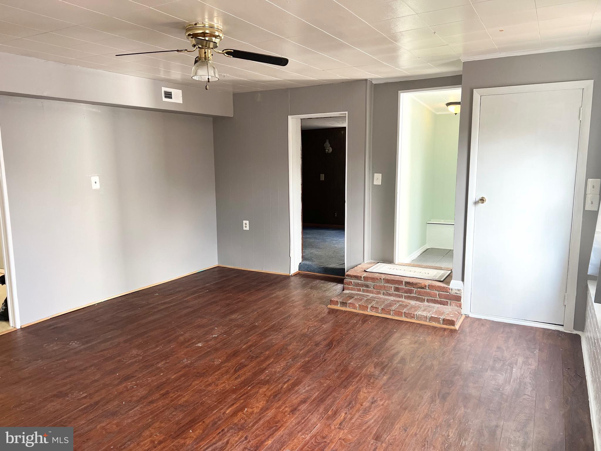 8110 Highpoint Road Clearwater Beach, MD 21226 - Photo 40 of 57 Living Room w/Hardwoods and Crown Molding!