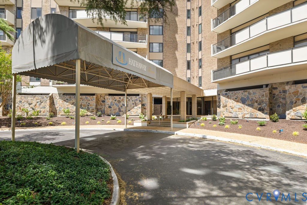 2956 Hathaway Road, Unit U704 Richmond, VA 23225 - Photo 1 of 42 Grand building entrance with a covered drive-throu