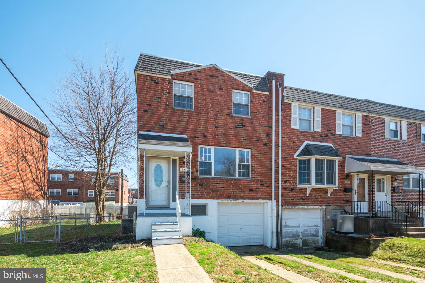 12519 Medford Road Philadelphia, PA 19154 - Photo 1 of 20 a front view of a house with a yard