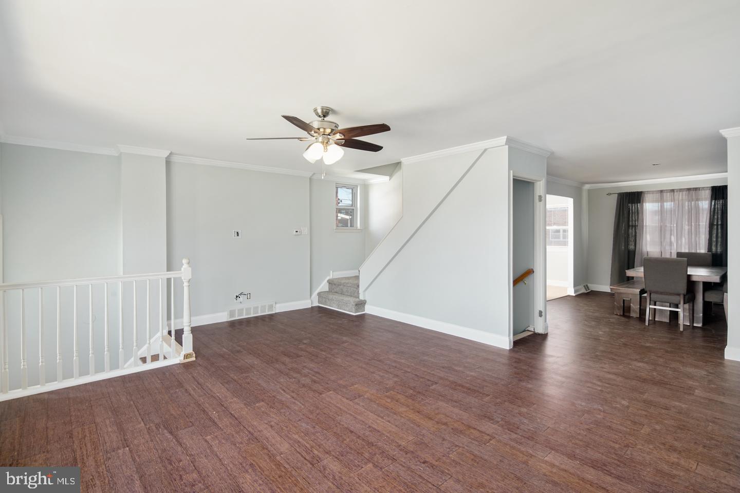 12519 Medford Road Philadelphia, PA 19154 - Photo 11 of 20 a view of an empty room with wooden floor and a ceiling fan