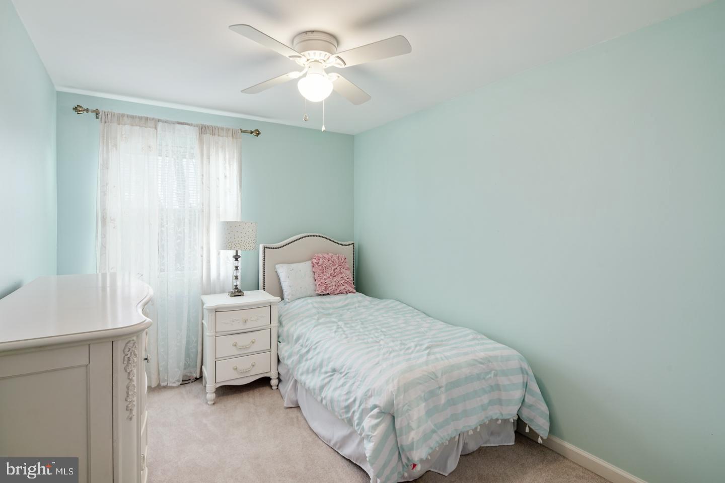 12519 Medford Road Philadelphia, PA 19154 - Photo 15 of 20 a bedroom with a bed and a window