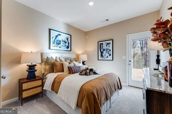 a bed room with double bed and a night stand