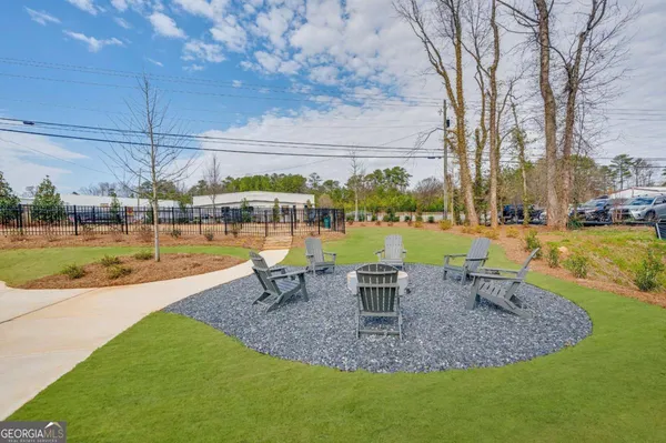 a view of a swimming pool with a patio