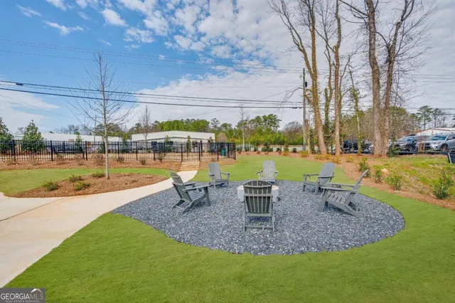 a view of a swimming pool with a patio