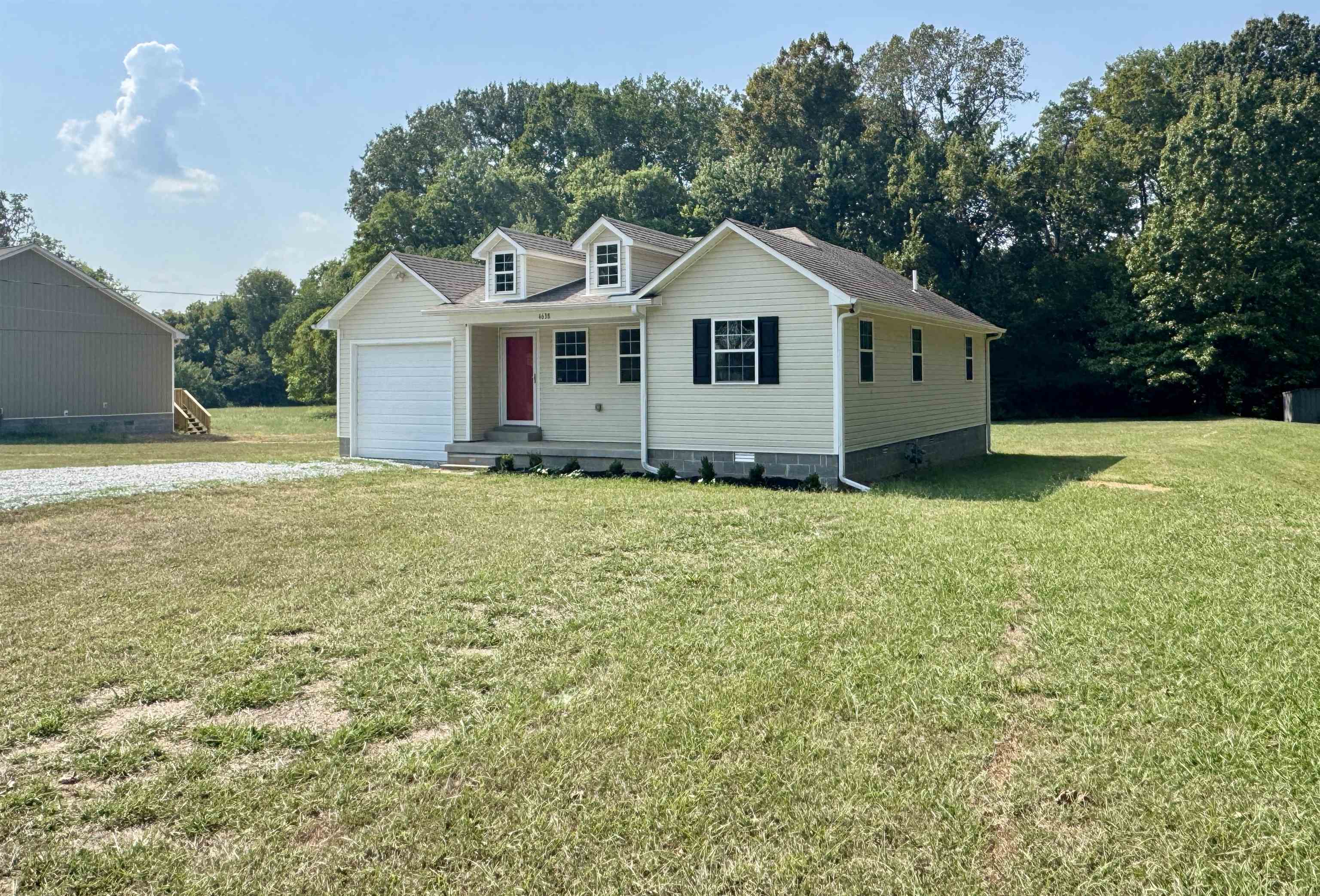 4638 Asbury Glimp Road Ripley, TN 38063 - Photo 2 of 16 a front view of a house with a yard