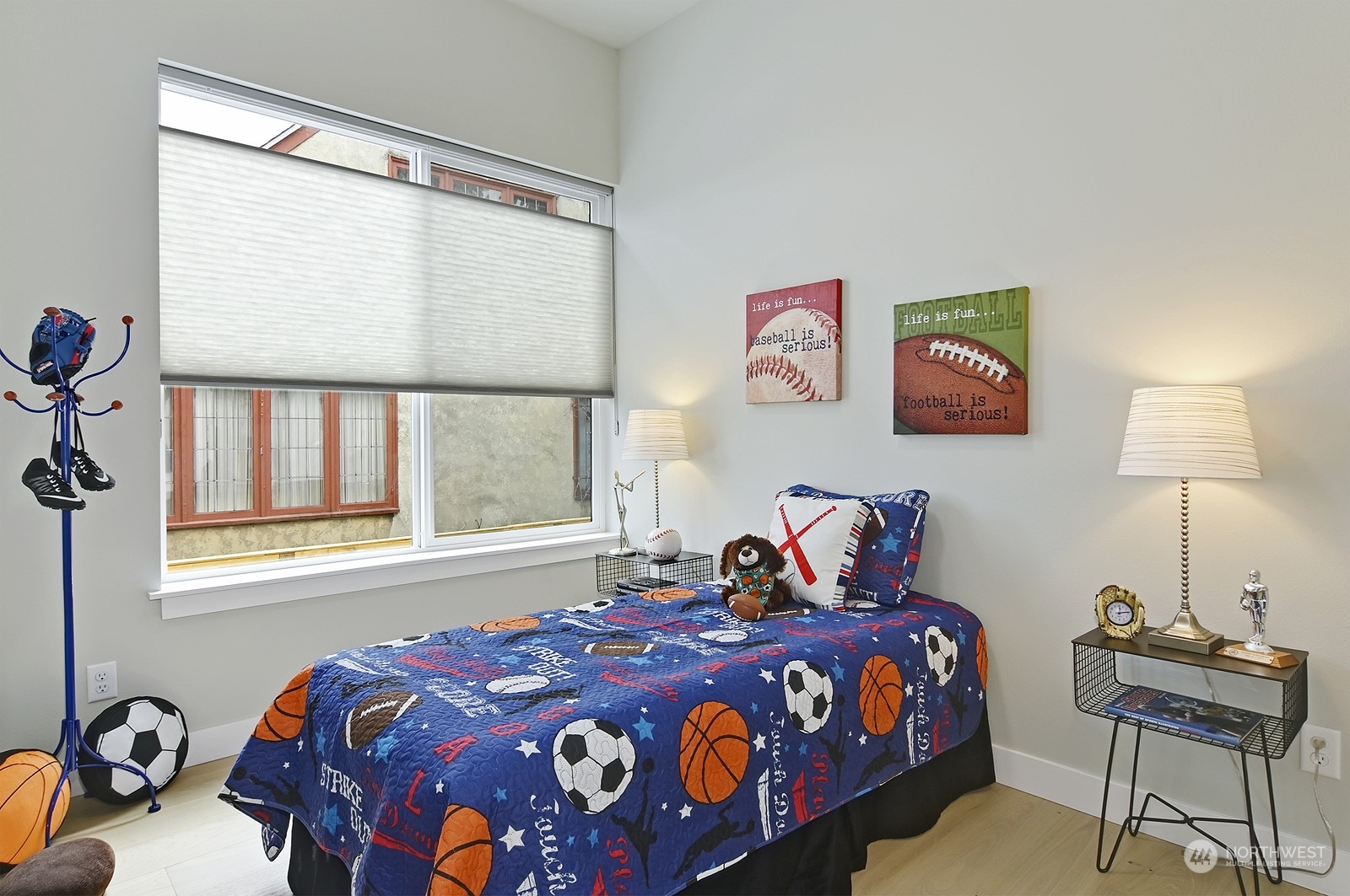 2707 South Ferdinand Street Seattle, WA 98108 - Photo 12 of 38 a bedroom with a bed and a window