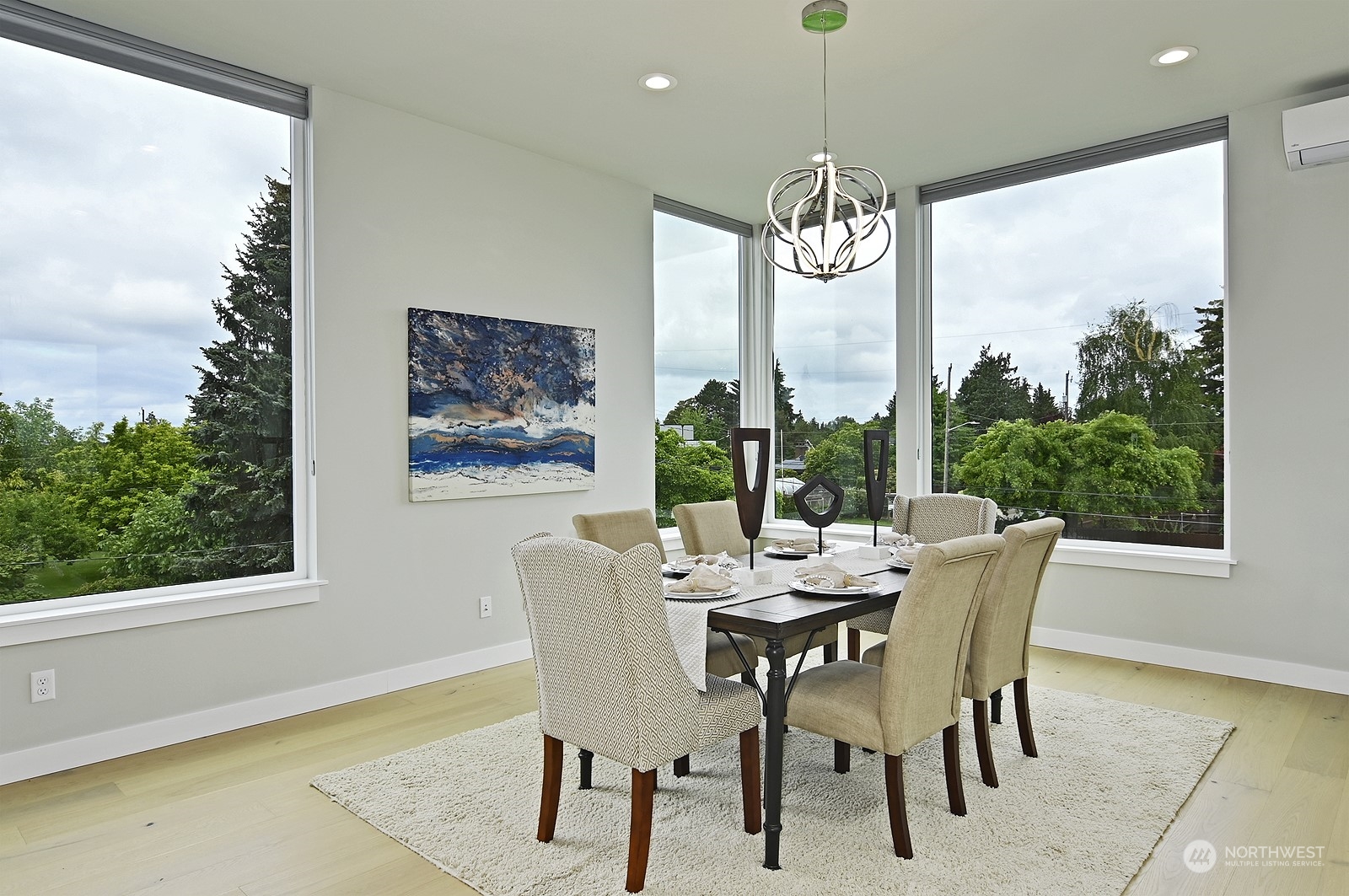 2707 South Ferdinand Street Seattle, WA 98108 - Photo 17 of 38 a dining room with furniture a chandelier and wooden floor