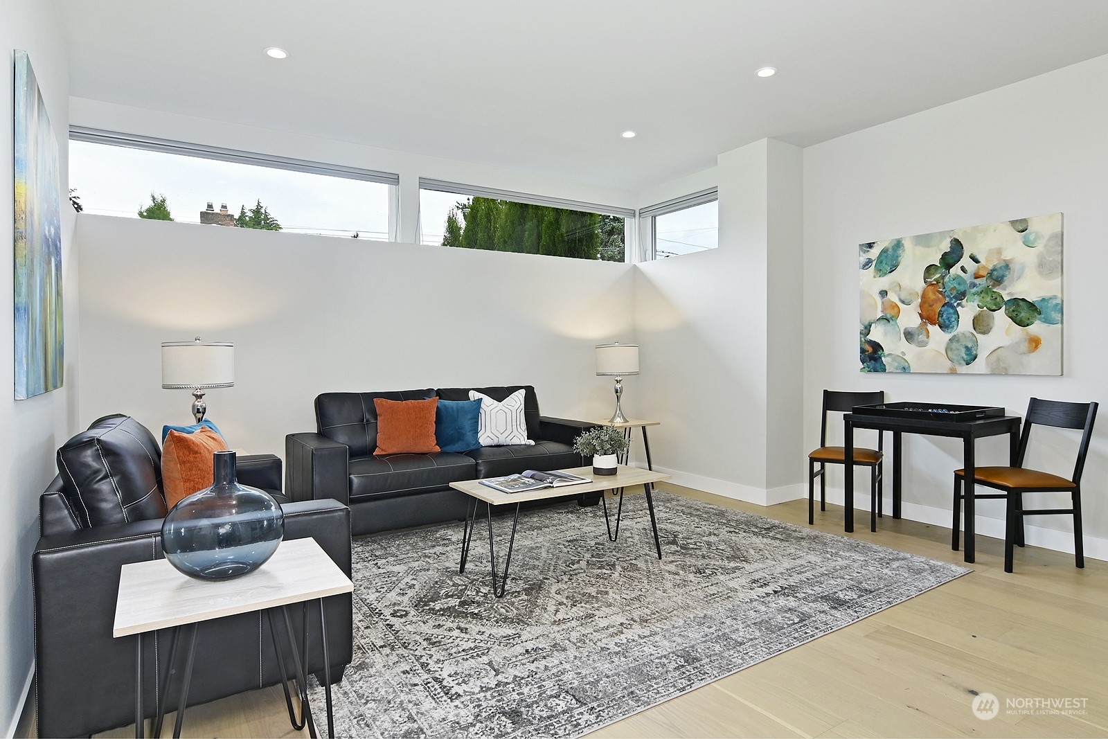 2707 South Ferdinand Street Seattle, WA 98108 - Photo 23 of 38 a living room with furniture and wooden floor