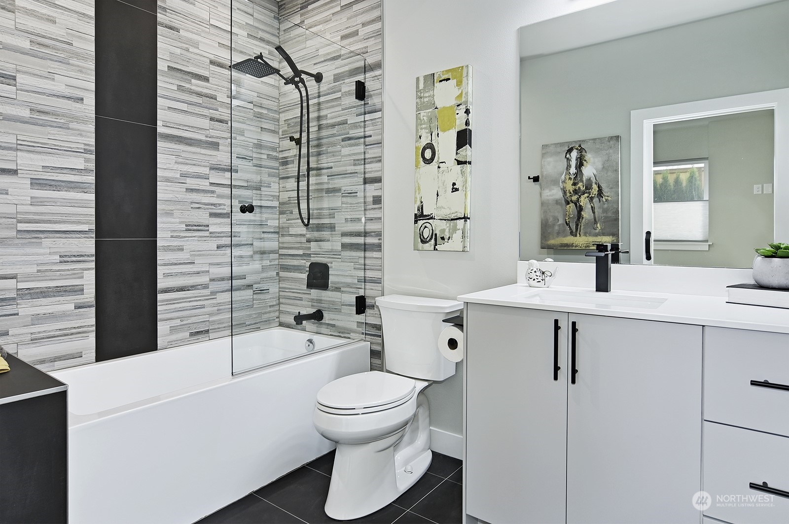 2707 South Ferdinand Street Seattle, WA 98108 - Photo 28 of 38 a bathroom with a sink a toilet and shower