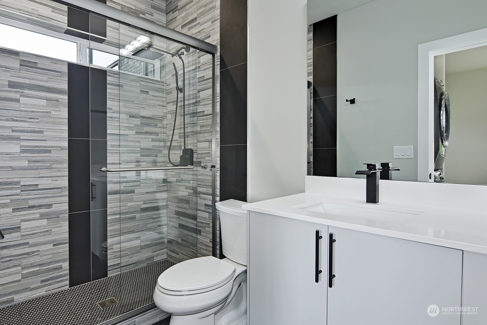 2707 South Ferdinand Street Seattle, WA 98108 - Photo 31 of 38 a bathroom with a sink toilet and shower