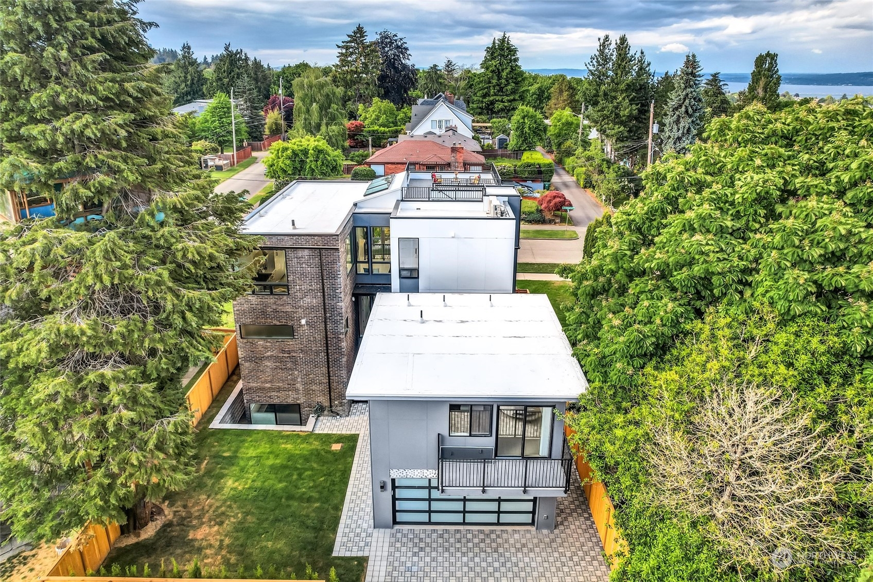 2707 South Ferdinand Street Seattle, WA 98108 - Photo 38 of 38 an aerial view of a house with a yard and potted plants