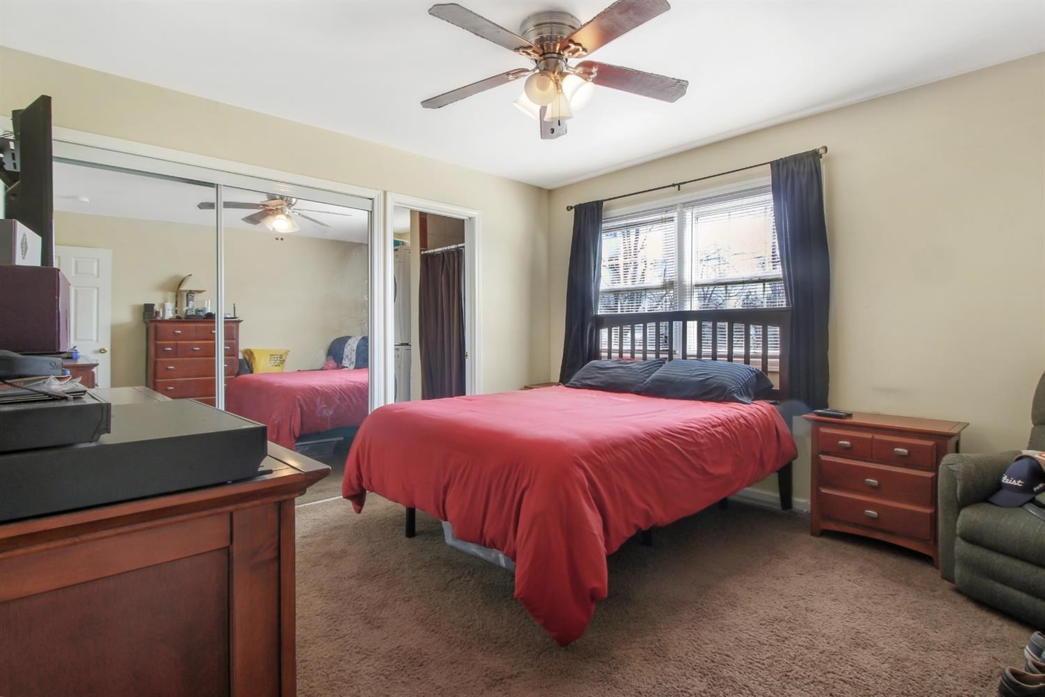 755 Fox River Road Valparaiso, IN 46385 - Photo 8 of 15 a spacious bedroom with a bed and a dresser in it