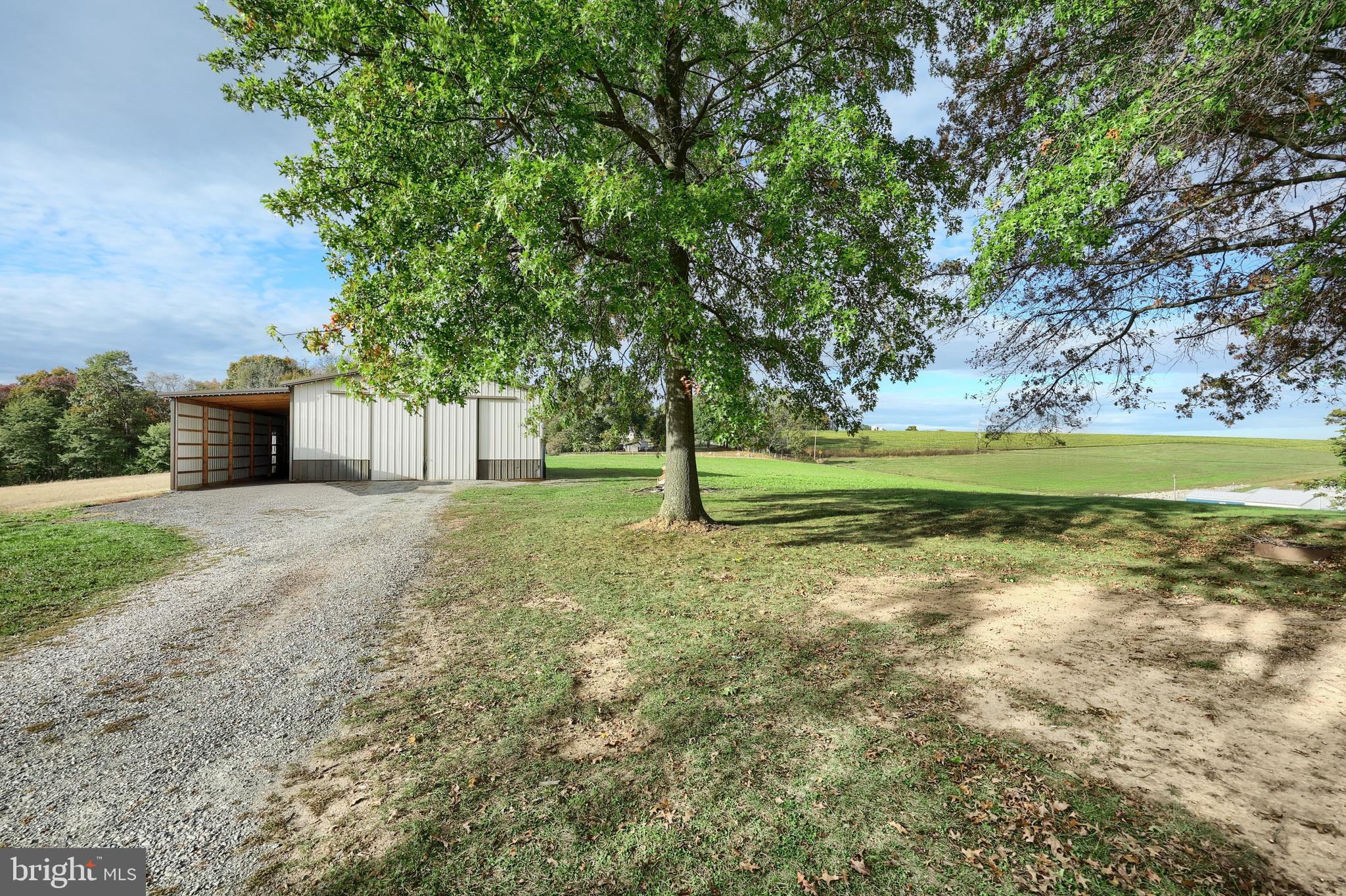 4877 Battlehill Road Brogue, PA 17309 - Photo 13 of 49 a view of a yard with an outdoor space