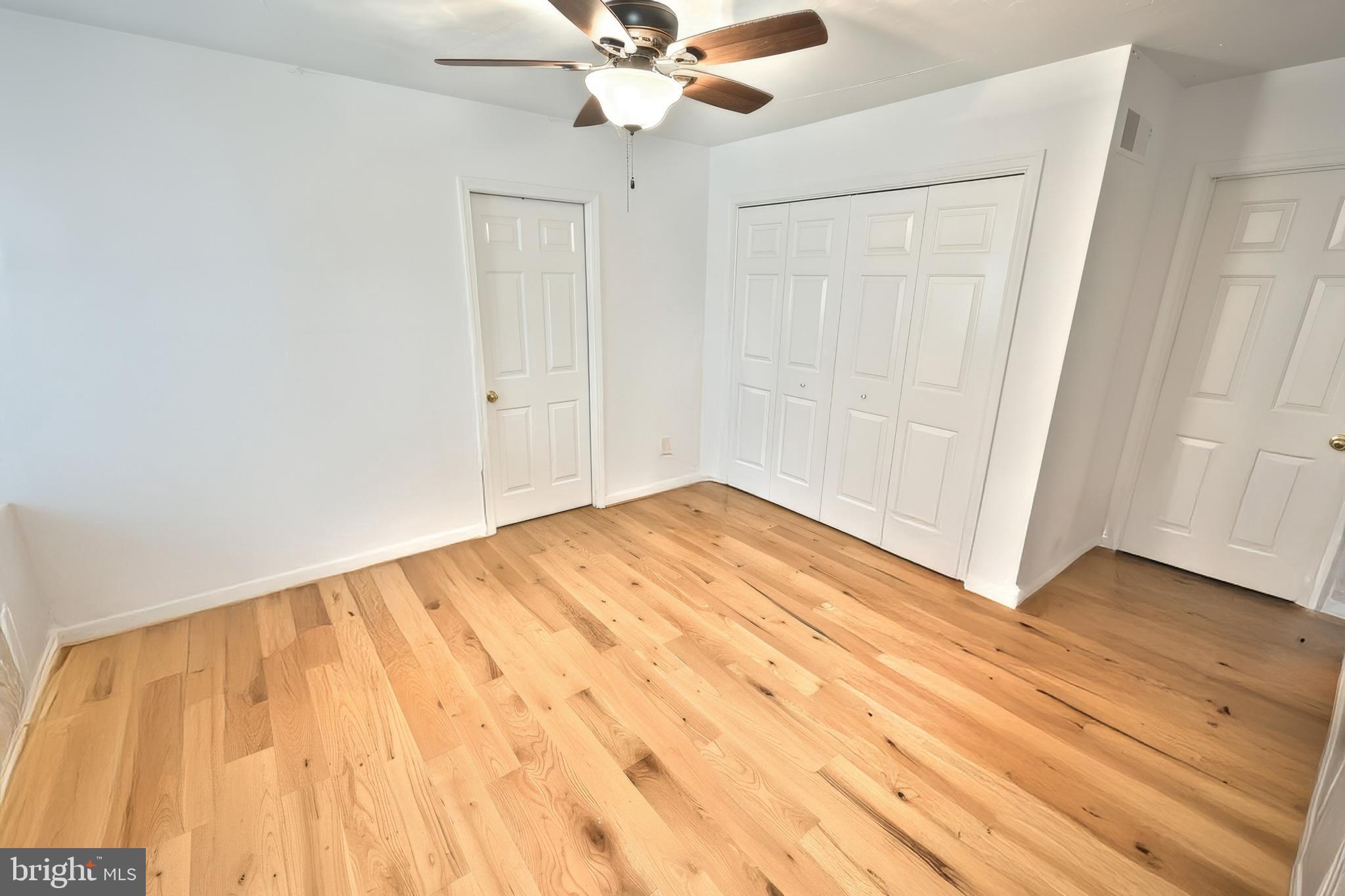 4877 Battlehill Road Brogue, PA 17309 - Photo 30 of 49 a view of a room with wooden floor and white walls