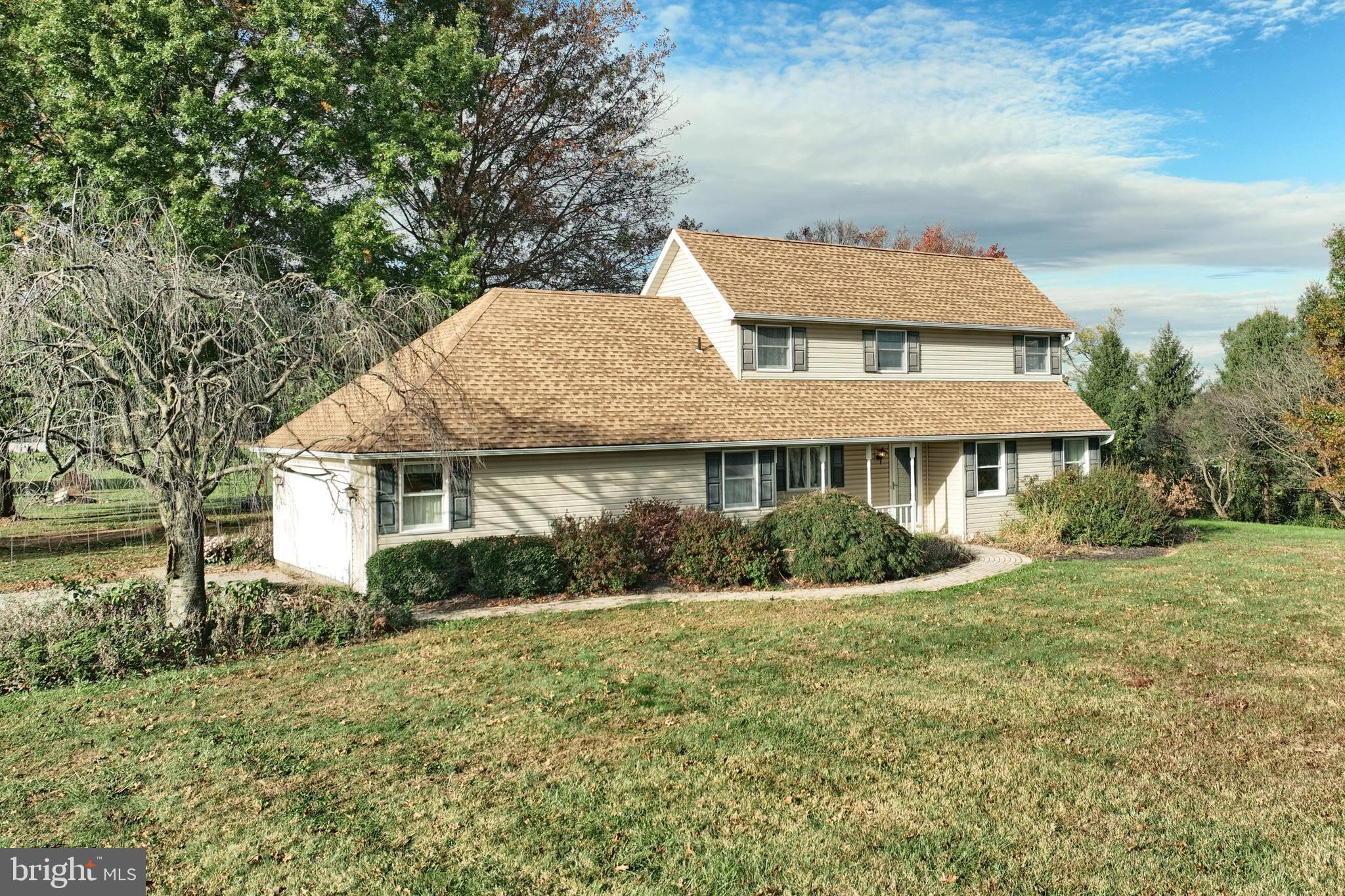 4877 Battlehill Road Brogue, PA 17309 - Photo 3 of 49 front view of a house with a yard