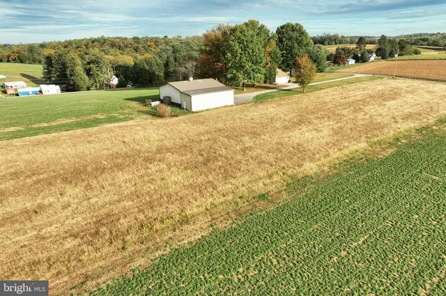 a view of a lake with a building in the background