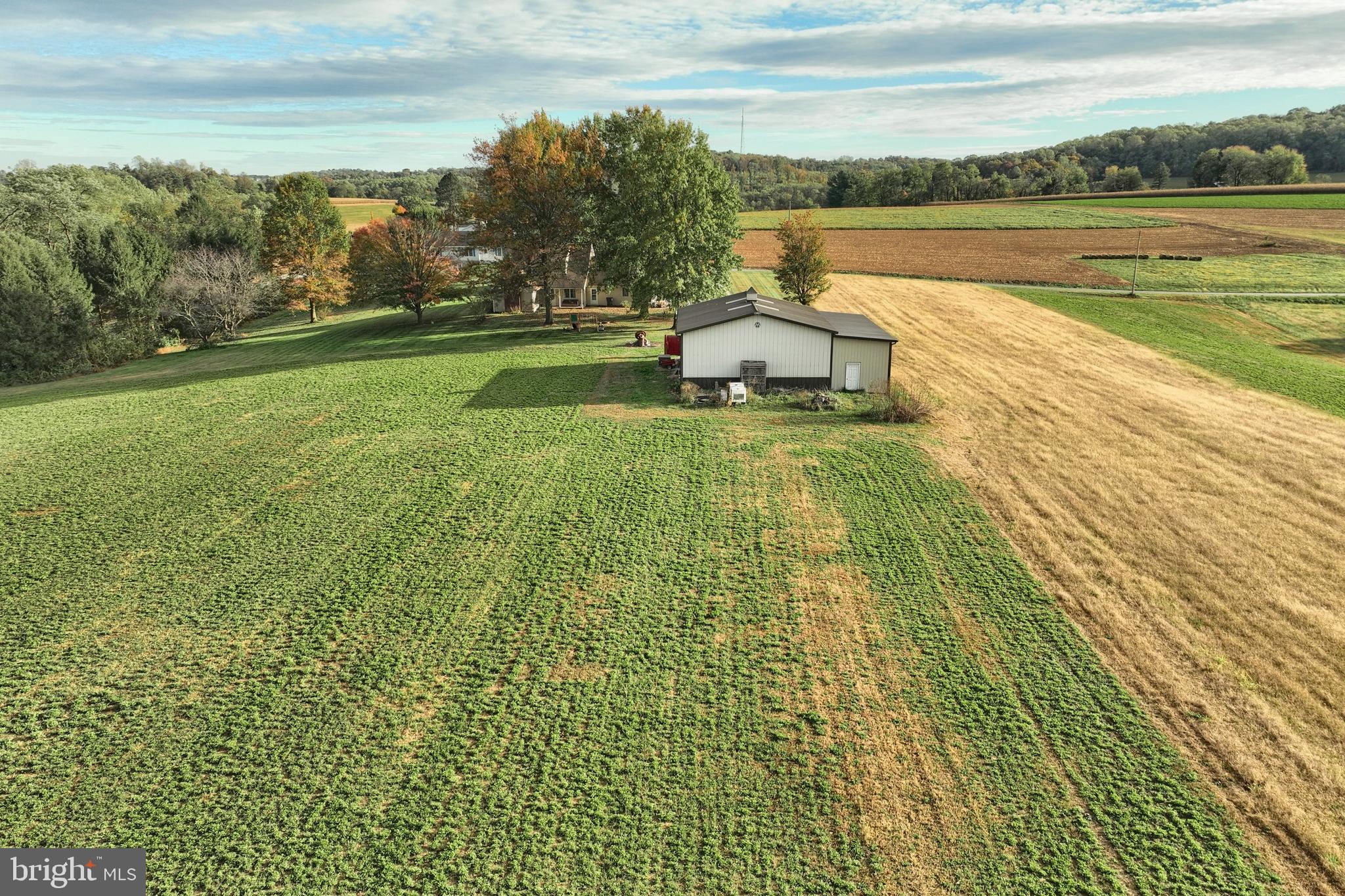 4877 Battlehill Road Brogue, PA 17309 - Photo 40 of 49 a view of a lake with a big yard