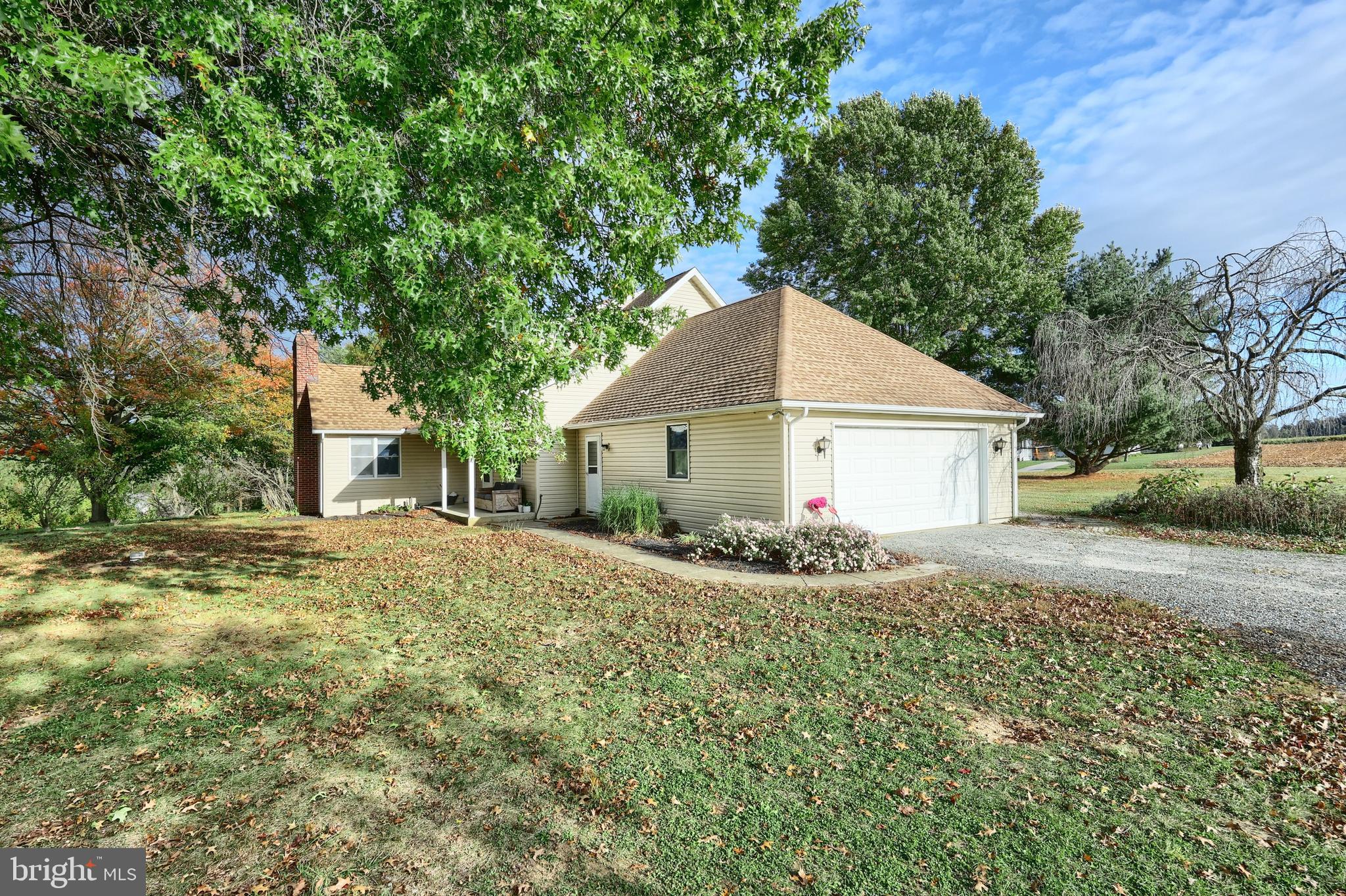 4877 Battlehill Road Brogue, PA 17309 - Photo 10 of 49 a view of a house with a yard and large tree