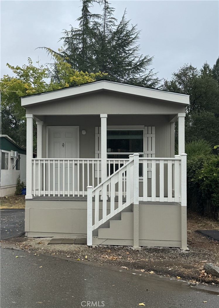 3390 Taylor Road, Unit 17 Loomis, CA 95650 - Photo 8 of 8 front view of a house with a small yard