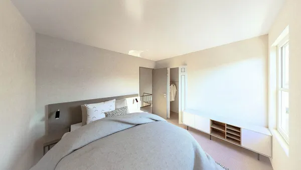 a kitchen with a stove a sink and a refrigerator