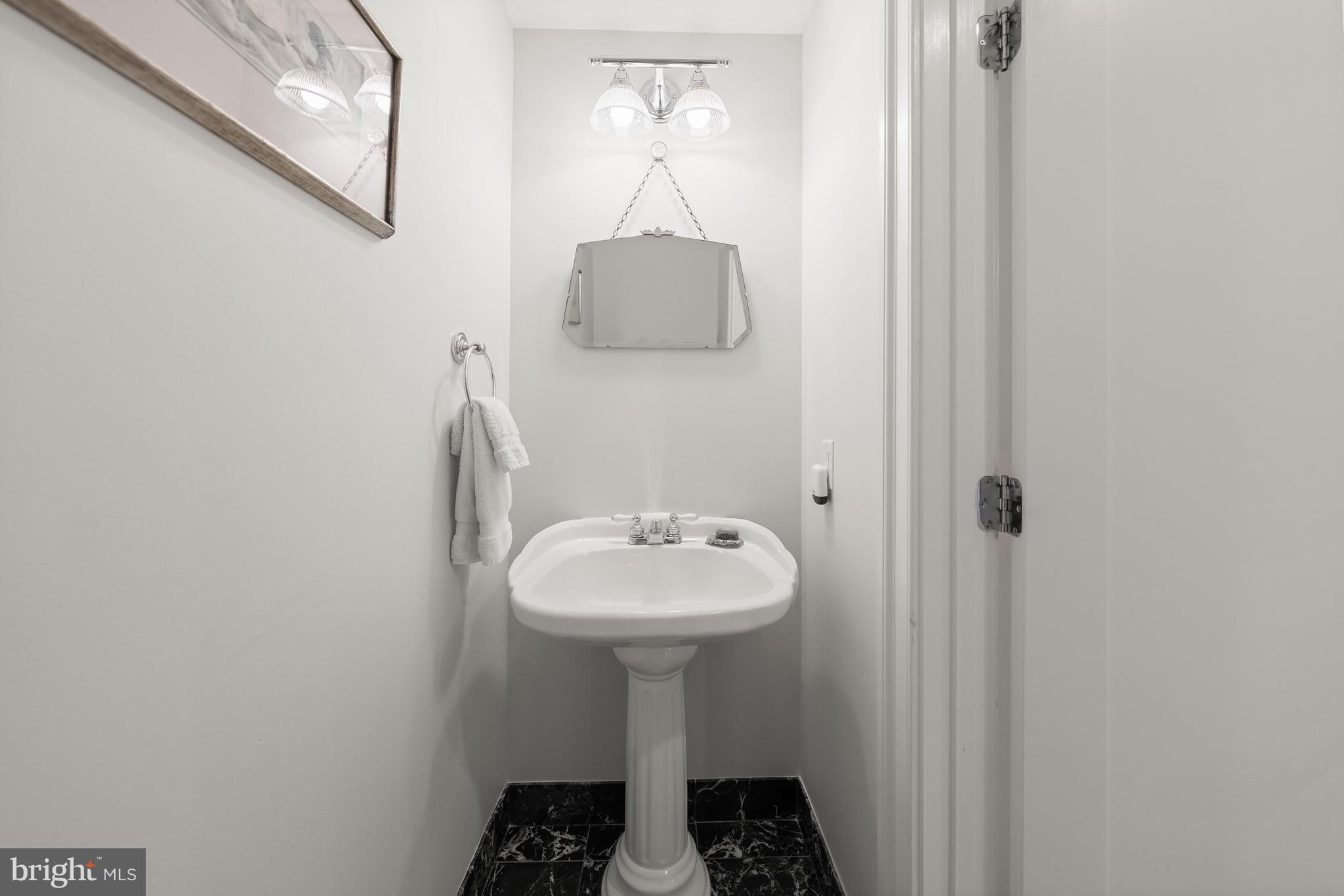 1819 37th Street Northwest Washington, DC 20007 - Photo 10 of 24 Main level half-bath