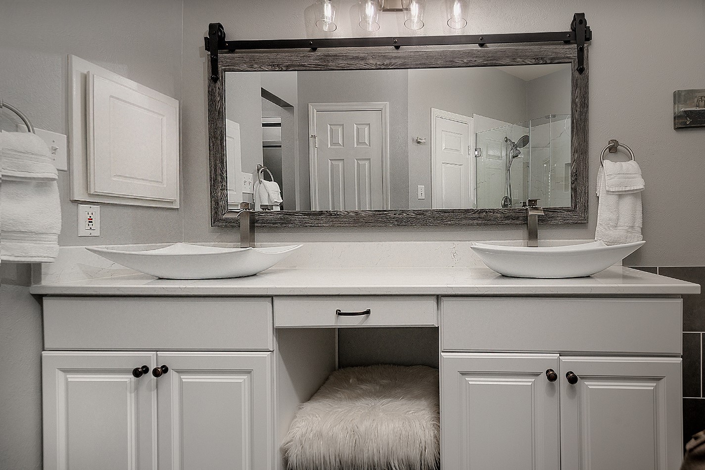 110 Wintergreen Trail The Woodlands, TX 77382 - Photo 19 of 32 a bathroom with a sink and a mirror