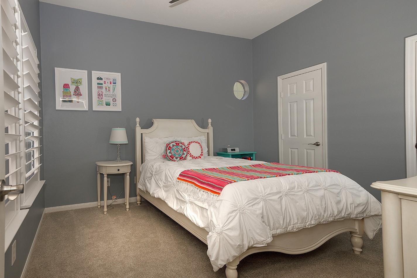 110 Wintergreen Trail The Woodlands, TX 77382 - Photo 24 of 32 a bedroom with a bed and a window
