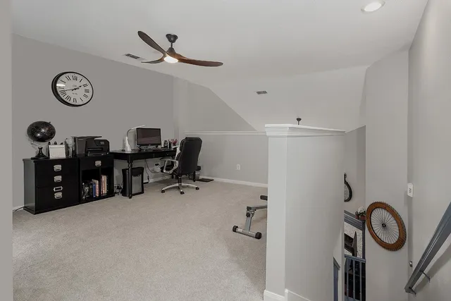 a view of a workspace with furniture