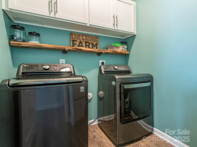a utility room with dryer and washer