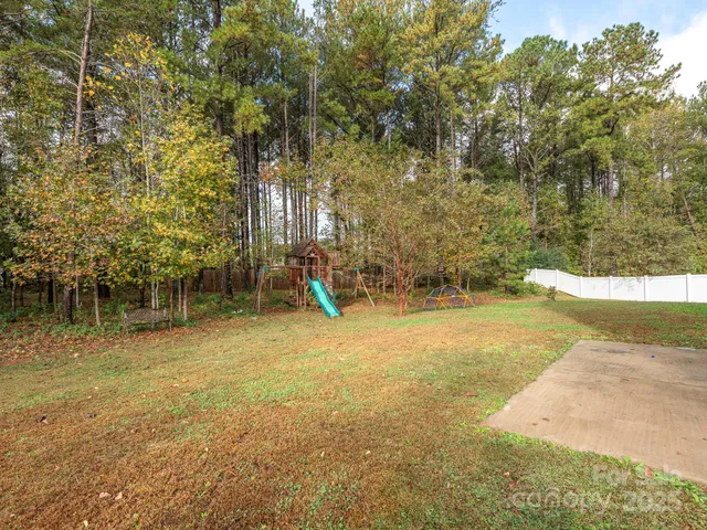 a view of a swimming pool with an outdoor space
