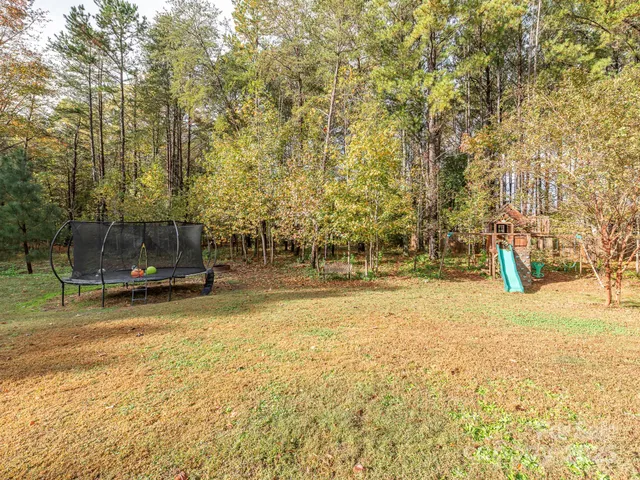 a view of a swimming pool with an outdoor space