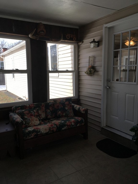 119 Fargo Street Springfield, MA 01119 - Photo 4 of 23 a living room with furniture and a window