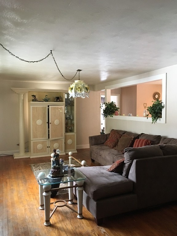 119 Fargo Street Springfield, MA 01119 - Photo 5 of 23 a living room with furniture and wooden floor