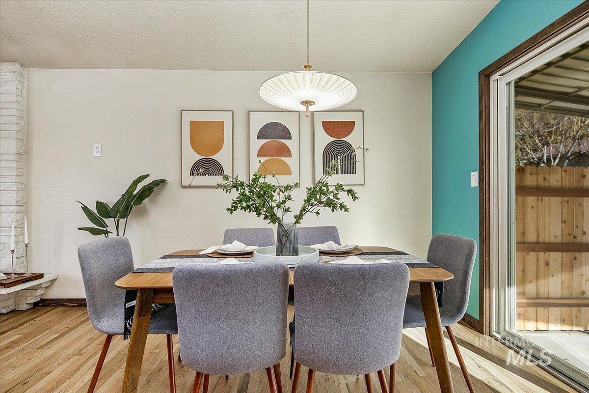2518 Lancaster Drive Boise, ID 83702 - Photo 21 of 41 Dining space featuring light wood-style flooring and a textured ceiling