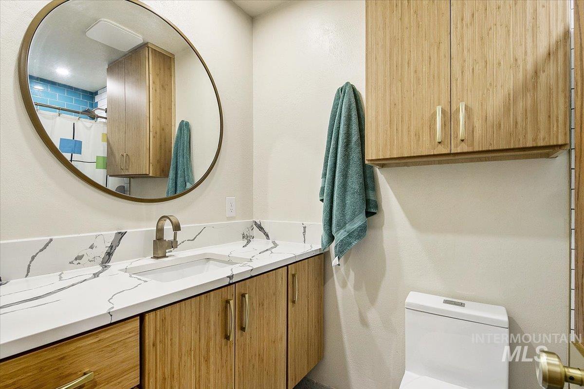 2518 Lancaster Drive Boise, ID 83702 - Photo 22 of 41 Bathroom featuring vanity and a shower with curtain