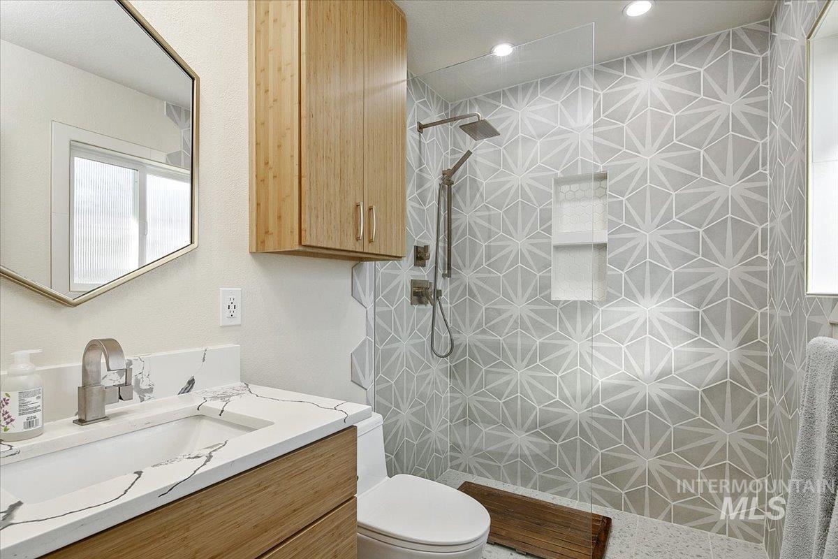 2518 Lancaster Drive Boise, ID 83702 - Photo 26 of 41 Bathroom with vanity and a walk in shower