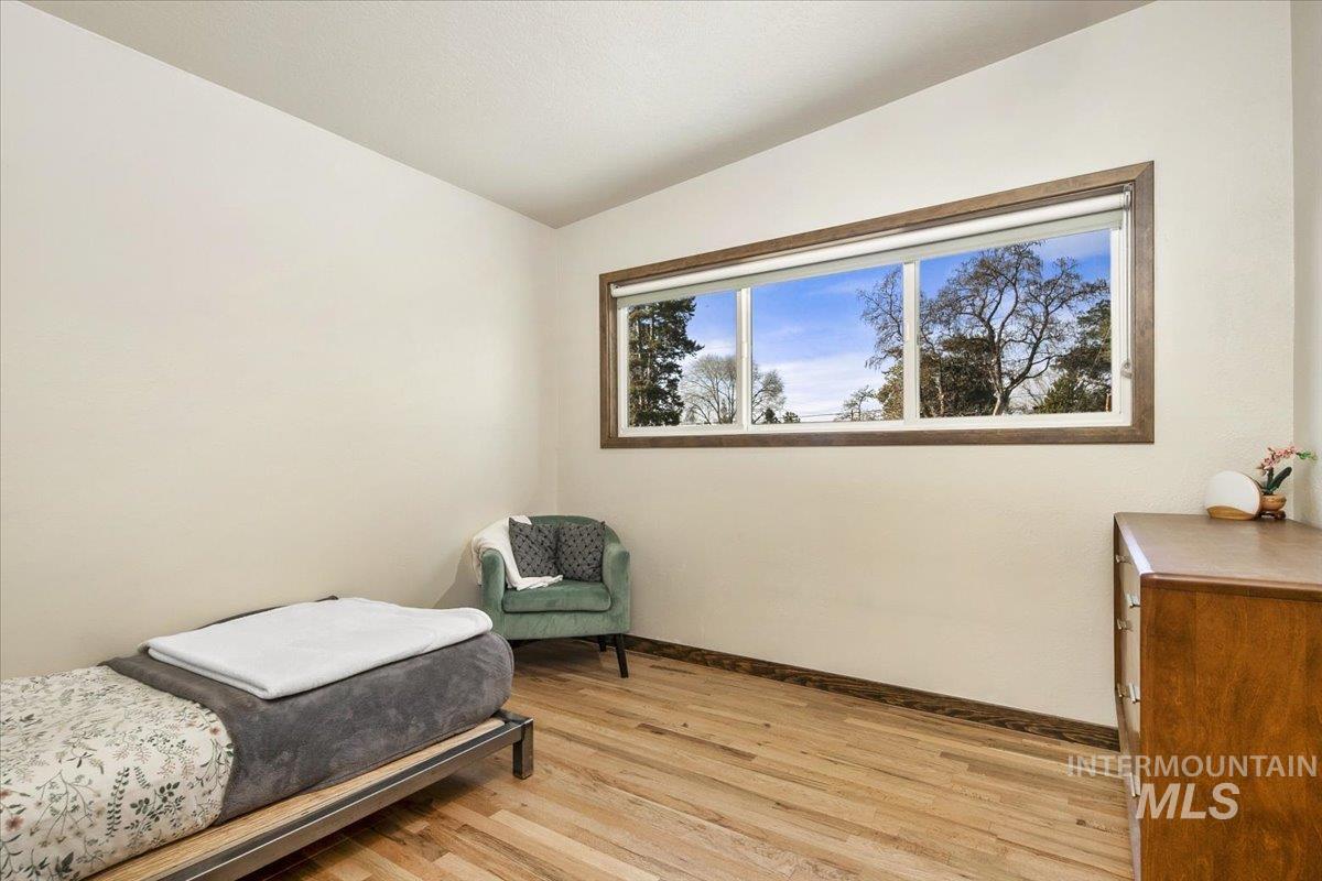 2518 Lancaster Drive Boise, ID 83702 - Photo 28 of 41 Bedroom with light wood-type flooring and lofted ceiling