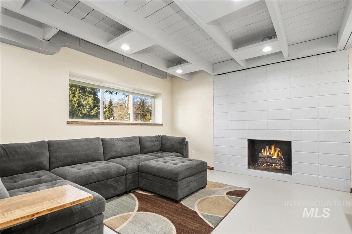 2518 Lancaster Drive Boise, ID 83702 - Photo 32 of 41 Living area with beam ceiling, a fireplace, and recessed lighting
